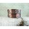 Copper fold formed and textured cuff bracelet with tactile braille "I am enough" in Contracted Grade 2 Braille Perkins E-Z Read Slate.